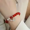 Pulsera original de ágata roja de moda nacional Colgante de calabaza de jade dorado y orquídea de perla Joyería al por mayor