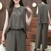 Moda para reducir la edad talla grande Holgado chica regordeta Chaleco sin mangas Conjunto de top Pantalones de pierna ancha Set de dos piezas Llegada nueva de verano Estilo occidental