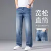 Calças jeans azuis leves de alta qualidade italianas para o verão para homens, calças casuais de negócios de corte reto soltas, calças da moda