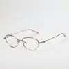Gafas Cuadradas 0020 para Hombre al por Mayor Danyang, Titanio Puro Estilo Huevo de Pato Ovalado Montura Pequeña Montura de Titanio Pluma Gafas Ovaladas para Mujer