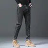 Jeans ajustados rectos elásticos cómodos de moda para hombre, nuevos pantalones casuales cálidos de primavera/otoño 2026 al por mayor