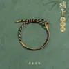 Pulsera con Colgante de Zongzi para Niños DIY Ajustable Festival del Bote del Dragón Cuerda Colorida 2026 Nueva Pulsera del Festival del Bote del Dragón Venta al por Mayor para Puestos de Mercado