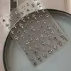 Pegatinas de arte de uñas blancas con diseño de cruz retro metálico y2k de chica picante, en relieve 3D, decoraciones de uñas DIY de alta gama, plateado