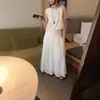 Conjunto de Camisa Elegante de Estilo Coreano Ins con Hombro Irregular y Nudo + Falda Adelgazante para Mujer - Nuevo Verano 2026