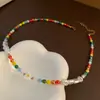 Colar de Pérolas com Flor de Margarida Colorida de Verão para Mulheres 2026 Novo Acessório Popular Corrente de Pescoço Corrente de Clavícula da Moda