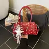 Bolso de verano nuevo y elegante para mujer, alto atractivo estético, diseño único de lunares, bolso pequeño cuadrado con un toque relajado, bolso cruzado