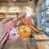 Llavero Creativo Lindo Gato Donut Muñeco Estéreo Cuerda para Teléfono Móvil Llavero de Goma Suave Colgante para Bolso Colgante