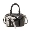 Corea del Sur Moda Tendencia Estilo Crema Simple Portátil Bolso Almohada de Cuero Suave Moda Femenina Versátil Casual para Viaje Bolso Cruzado