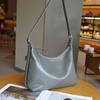 Piel de vaca de curtición vegetal de primera capa bolsa de mujer versátil de nicho bandolera bandolera bolsa de mujer simple bolsa de cremallera tipo dumpling bolsa de concha