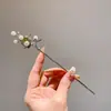 Otoño e invierno nuevo pasador de pelo retro nuevo borla antigua china alto sentido temperamento pasador para ropa china paso sacudida accesorios para el cabello al por mayor
