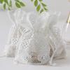 Bolsa de encaje blanca con agujeros pequeños de 10*14 cm, bolsa para guardar joyas, al por mayor en stock, fondo redondo, seda de leche, bolsillo creativo de cordón