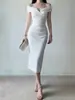 Vestido de noche negro de hombros descubiertos para mujer, de longitud media, vestido ajustado de sirena, adecuado para banquetes, ser anfitrióna y fiestas, vestido elegante