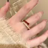 Anel aberto Angla Red Drop Glaze feminino leve luxo nicho anel de dedo de alta qualidade anel retrô branco empilhado