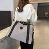 Bolsa de viagem de comércio exterior, bolsa de viagem de curta distância, bolsa de bagagem portátil 2025, nova bolsa de fitness esportiva leve e de grande capacidade
