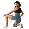 Pantalones de yoga de estilo nuevo sin línea de vergüenza color piel para mujer, cintura alta, realce de glúteos, compresión abdominal, shorts deportivos de tres puntos