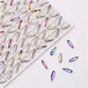 Joyería para arte de uñas taladro de cristal brillante multicorte con forma de semillas de melón largas blancas gotas de agua accesorios para uñas venta al por mayor transfronteriza