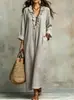 Moda femenina europea y americana 2026 transfronteriza sitio independiente de Amazon casual de vacaciones color liso cuello en V manga larga vestido largo