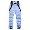 Los Pantalones de Esquí Son Cortavientos, Impermeables, Cálidos y Transpirables, Mismo Estilo para Hombres y Mujeres, Más Algodón para Invierno pero Venta al por Mayor por Fabricante de Pantalones de Esquí