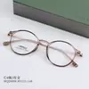 HQ20008 Estilo Coreano Moderno Montura Pequeña Redonda Modificada Para Dar Forma al Rostro Acero Titanio Espejo Plano Personalizada Moderna Montura para Gafas de Miopía