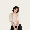 Bufanda chal de punto hueco triangular versátil de estilo minimalista y casual para mujer, prenda exterior fina de seda de hielo para verano para habitaciones con aire acondicionado