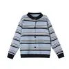 Conjunto de cárdigan de punto para niña 2026 Otoño/Invierno Nuevo Estilo Coreano Moda Suéter a rayas que rejuvenece Pantalones de pierna ancha Conjunto de dos piezas