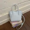 Bolso Cuadrado Pequeño Versátil de Moda 2026 Nuevo Estilo Bolso Cesta de Hombro Único Bolso Cubo Cruzado de Moda Versión Coreana Bolso para Mujer Súper Popular