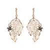 Pendientes de Plata con Diseño de Hoja de Mariposa Hueca Transfronterizos Europeos y Americanos Pendientes de Lujo Ligero de Gama Alta Pendientes de Nicho Venta al por Mayor