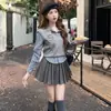 Academia KapeiNuevo Conjunto de Otoño: Conjunto Trendy de Tres Piezas Estilo Universitario: Falda Plisada de Punto Ajustada y Top