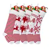 Calcetines navideños infantiles transfronterizos calcetines altos de rayas tejidas decoraciones navideñas calcetines navideños con cascabeles calcetines de elfo