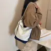 Bolsa Tote de Lona Color Block Estilo Coreano Feminina 2026 Nova Grande Capacidade Versátil Bolsa de Ombro Artística Casual Bolsa de Axila