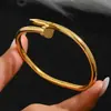 Pulsera de acero inoxidable dorada transfronteriza, traje de pulsera de trébol de cintura pequeña con tachuelas, brazaletes dorados