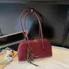 Nova bolsa de axila com design de nicho, bolsa de ombro estilosa para mulheres, bolsa de mão de alta costura para mulheres, bolsa bowling de grande capacidade para mulheres