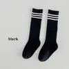 1536 Calcetines infantiles al por mayor, calcetines de moda para niños primavera y otoño, calcetines altos estilo universitario de tres rayas, calcetines de algodón para estudiantes, calcetines infantiles unisex