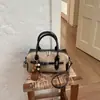 2026 Nova Superfície Fosca Boston Pequena Nicho Moda Bolsa Quadrada Pequena Feminina Simples de Mão Transversal Bolsa de Ombro Único Retrô