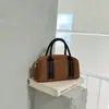 Bolsa de bowling casual retrô americana de mão para mulheres, nova bolsa de ombro da moda outono 2026, bolsa transversal de design nicho