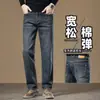 Jeans negros y grises de alta gama para hombre, estilo veraniego delgado, corte recto ancho holgado con bolsillos laterales, pantalones largos casuales elásticos para hombres de mediana edad