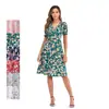 Vestido de playa de diseño propio transfronterizo Amazon verano nuevo bohemio estampado vestido de cuello en V punto toma real