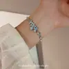[Beso de Mar Estrellado] Pulsera de Perlas Florales Degradadas para Mujer Nuevo Estilo Chino Retro Diseño de Nicho Lujo Ligero Pulsera Elegante