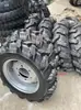 Conjunto de Neumático Agrícola para Tractores Pequeños de Mano, Patrón de Banda de Rodadura Profunda de Cuatro Ruedas 400650600-12-16 Llanta de Acero para Campo de Arroz