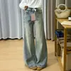Diseño de pierna ancha pantalones acampanados rotos y desgastados para mujer estilo callejero americano adelgazantes de cintura alta jeans de microcampana modernos