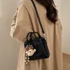 Bolso Cubo Simple de Mano Estilo Coreano para Mujer Moda Casual Nueva Primavera 2026 Bolso de Hombro Cruzado con Textura de Alta Calidad