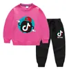 Roupas infantis coreanas novas para primavera e outono suéter infantil calça conjunto de duas peças TikTok TikTok algodão manga longa terno