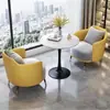 Juego de sofá de un asiento y mesa de centro para recepción de hotel, sala de reuniones de clientes, oficina de ventas, salón de belleza, centro comercial, mueble de sala de exposición, gama alta