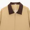 Atacado de Roupas Femininas Transfronteiriças Outono e Inverno 2025 Nova Moda Feminina Estilo Europeu e Americano Jaqueta Bicolor com Gola de Retalhos e Bolsos para Mulheres