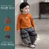 Conjunto casual de invierno para niños: chal acolchado, pantalones elegantes de mezclilla de pierna curva y un conjunto de tres piezas para bebés niños