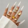 Anillo de combinación de flor de perla barroca transfronteriza europea y americana para mujer, anillo de lava de metal plisado de moda retro.