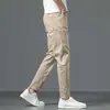 Jeans cortos de seda de hielo de alta gama para hombre, delgados de verano, rectos, corte slim, color caqui, casual, pantalones de hombre de 9 puntos