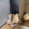 Bolsa feminina grande capacidade estilo retrô, nova bolsa de ombro casual 2026, design simples adequada para trabalho e deslocamento, bolsa de bolinho transfronteiriça