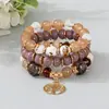 Bestseller transfronteiriço: Pulseira com pingente de árvore da vida em liga com vazado estilo boêmio, pulseira de corda elástica multicamadas com contas de vidro