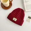 Gorro de Punto Grueso Estilo Coreano Cara Sonriente Sencilla para Mujer con Terciopelo Extra Grueso Gorro de Lana con Letras para Hombres y Mujeres Venta al por Mayor